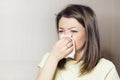 Woman holds handkerchief, napkin in her hand. runny nose, common cold, virus Royalty Free Stock Photo