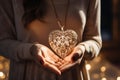 A woman holds a heart-shaped object, expressing love and affection in her hands, A hand holding heart-shaped jewelry as a gift, AI Royalty Free Stock Photo