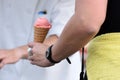 A woman is holding an ice cream cone Royalty Free Stock Photo