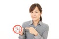 Woman holds non smoking sign Royalty Free Stock Photo