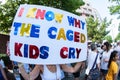 Woman Holds Posterboard Sign At Atlanta Immigration Protest Rally