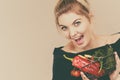 Woman holds shopping basket with vegetables Royalty Free Stock Photo