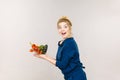 Woman holds shopping basket with vegetables Royalty Free Stock Photo