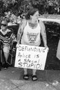 A Woman Holds a Sign Against Defunding the Police Royalty Free Stock Photo