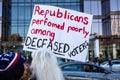 A Woman Holds a Sign Implying Biden Received Votes from Deceased People at a Stop the Steal Rally Royalty Free Stock Photo