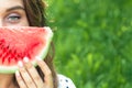 Woman holds slice of watermelon Royalty Free Stock Photo