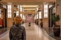 Woman in Hollywood Dolby Theater dream of walking on red carpet for Oscar statuette for best acting role in film Royalty Free Stock Photo