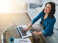 Woman, home and card or laptop on sofa, online shopping and internet banking with customer and budget planner on table