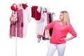 Woman in home closet choosing clothing, indecision Royalty Free Stock Photo