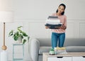 Woman, home and happy portrait with laundry, living room and towels for housekeeping or cleaning service. Hospitality Royalty Free Stock Photo
