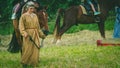Woman with horse on the Medieval festival in the Old Ladoga fortress. Leningrad Region, Russia june 2018. Historical concept