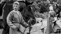 Woman with horse on the Medieval festival in the Old Ladoga fortress. Leningrad Region, Russia june 2018. Historical concept