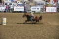 Woman on horse needs to run around barrel at Rodeo Santa Maria, CA, USA