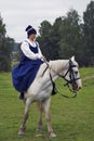 A woman horse rider at Borodino battle historical reenactment in Russia