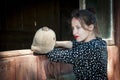 Woman at horse stable in countryside ranch. Girl horse rider in summer outdoor. Equestrian and horseback riding. Horse stable with Royalty Free Stock Photo