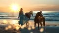 woman and horses on sand wild beach at sea ,desert at sunset animal world nature landscape Royalty Free Stock Photo