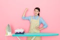 Woman housekeeper finished ironing clothing work Royalty Free Stock Photo
