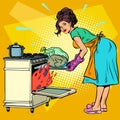 Woman housewife bakes bird in the oven Royalty Free Stock Photo