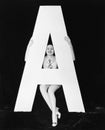 Woman with huge letter A