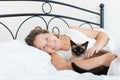 Woman hugging a Siamese cat. Royalty Free Stock Photo