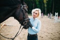 Woman hugs her horse, friendship, horseback riding Royalty Free Stock Photo