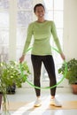 Woman with hula hoop Royalty Free Stock Photo