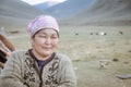 Woman with humble smile in Kyrgyzstan