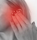 Woman hurts ear, hearing loss concept