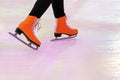 Woman ice skating. winter outdoors on ice rink. ice and legs Royalty Free Stock Photo