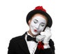 Woman in the image mime holding a handset