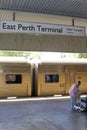 Woman travels with the Indian Pacific train, East Perth Terminal, Australia