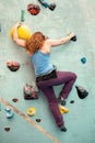 Woman Indoor Rock Climbing. Body Shape Climber Back View Royalty Free Stock Photo