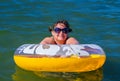 Woman on the inflatable buoy