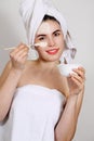 Woman inflicts a mask Royalty Free Stock Photo