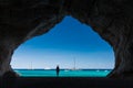 Woman inside a cave at Cala Luna beach Royalty Free Stock Photo