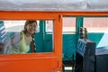 Woman inside litorina on Estrada de Ferro Madeira-Mamore railroad in Porto Velho RO