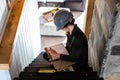 Woman inspector reviewing stairs