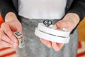 Woman installing 9 volt battery in smoke detector Royalty Free Stock Photo