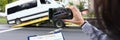 Woman insurance agent films broken minibus on smartphone