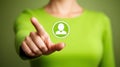 Woman interacting with futuristic user interface, activating green button with person icon Royalty Free Stock Photo