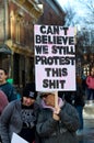 Woman with interesting banner in Iowa City