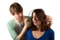 Woman interupts man with headphones Royalty Free Stock Photo