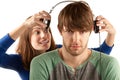Woman interupts man with headphones Royalty Free Stock Photo