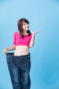 Woman show weight loss Royalty Free Stock Photo