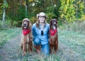 Woman with Irish Setter dogs Royalty Free Stock Photo