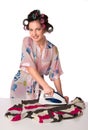 Woman is ironing clother