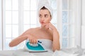 Woman ironing clothes Royalty Free Stock Photo