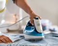 Woman Ironing Fabric Before Sewing Royalty Free Stock Photo