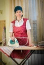 Woman Ironing in the Kitchen Royalty Free Stock Photo