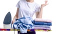 Woman ironing laundry clothing towels on iron board Royalty Free Stock Photo